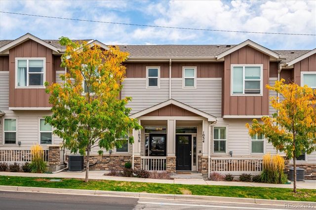 a backyard of a house with seating space