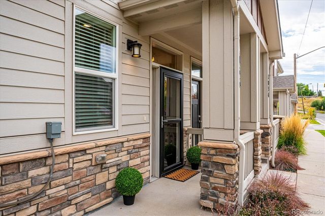 a view of park with large trees