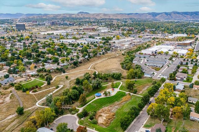 a view of street with flower on side of it