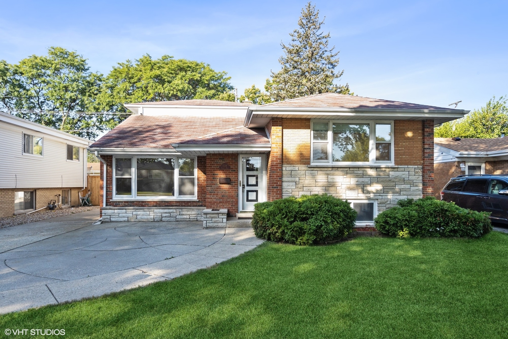 1136 Forest Road La Grange Park, IL 60526 - Photo 1 of 1 a front view of a house with a garden