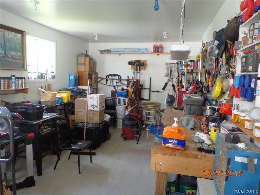 14015 Mar-Ral Road Alpena, MI 49707 - Photo 41 of 45 Garage interior, rear workshop