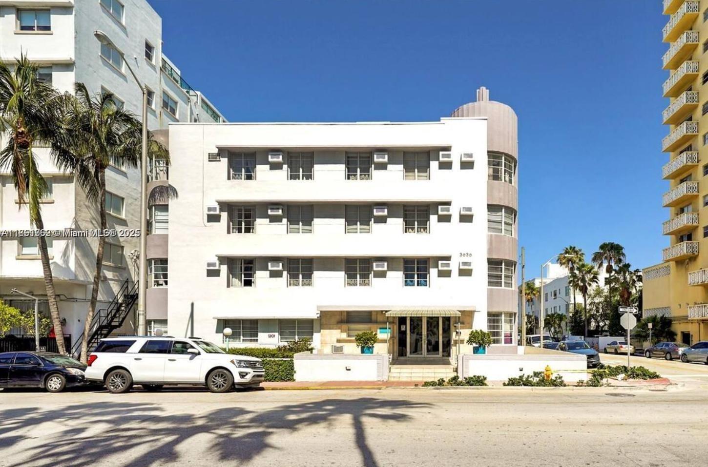 3030 Collins Avenue, Unit 1E Miami Beach, FL 33140 - Photo 14 of 15 a building with street view