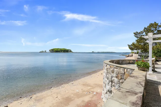 a view of a lake with a yard