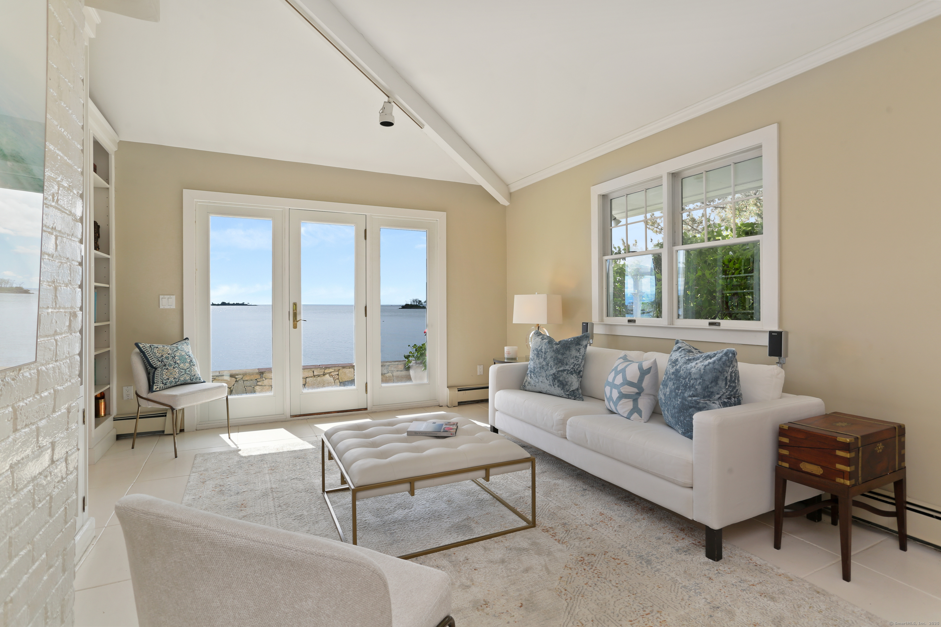 34 Shorehaven Road Norwalk, CT 06855 - Photo 38 of 40 a living room with furniture and a large window