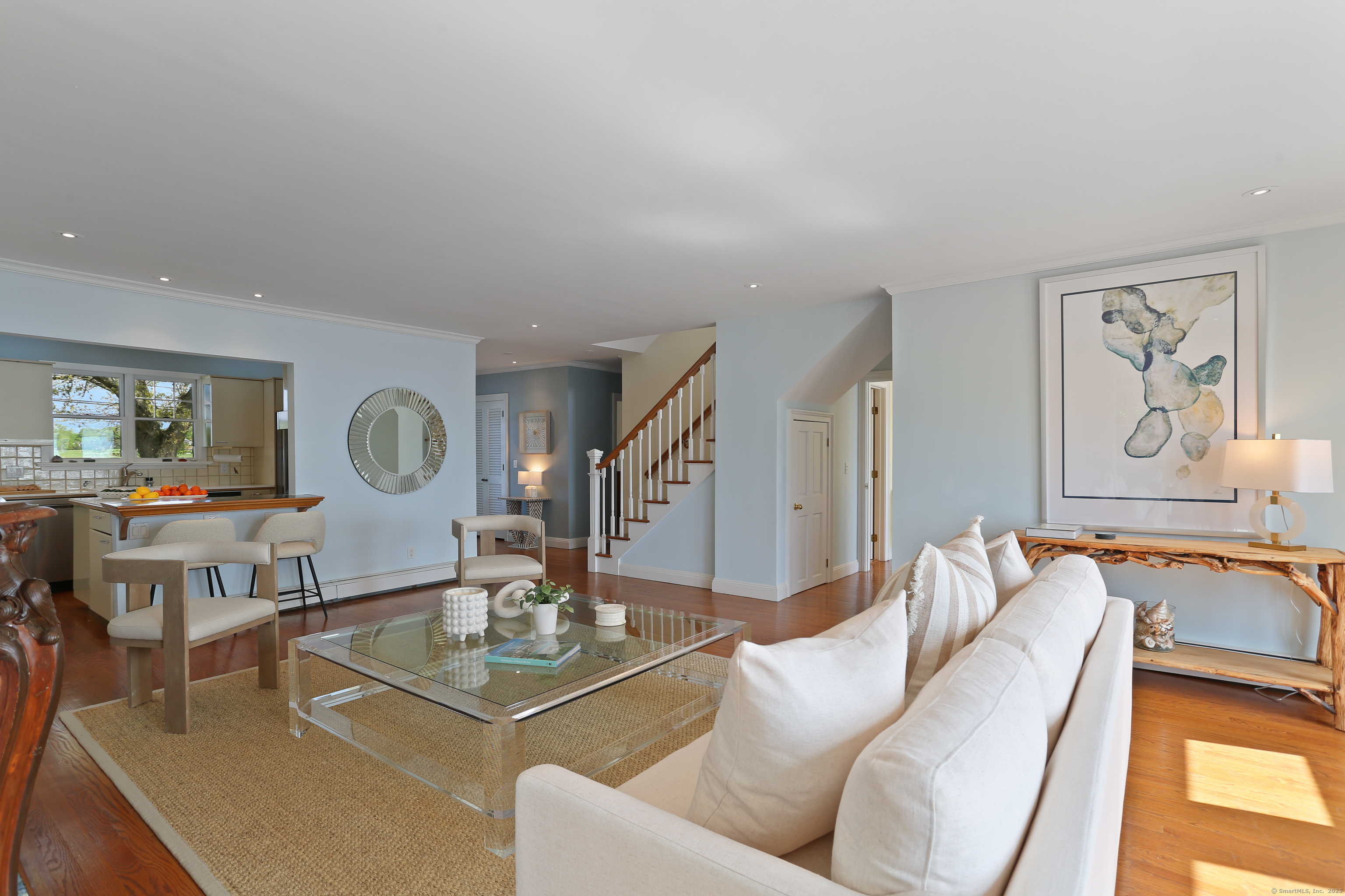 34 Shorehaven Road Norwalk, CT 06855 - Photo 7 of 40 a living room with furniture and a large window