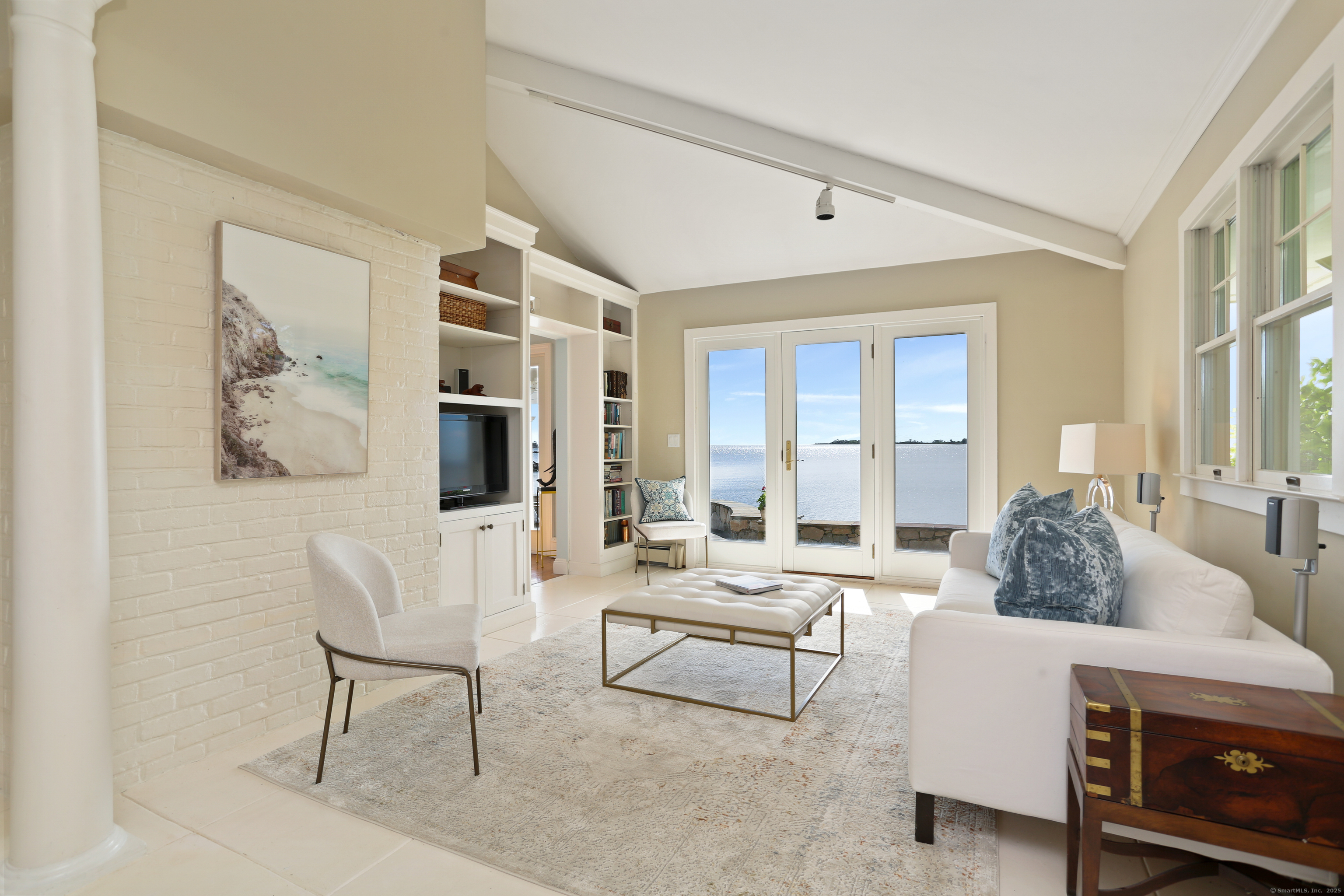 34 Shorehaven Road Norwalk, CT 06855 - Photo 8 of 40 a living room with furniture and a large window