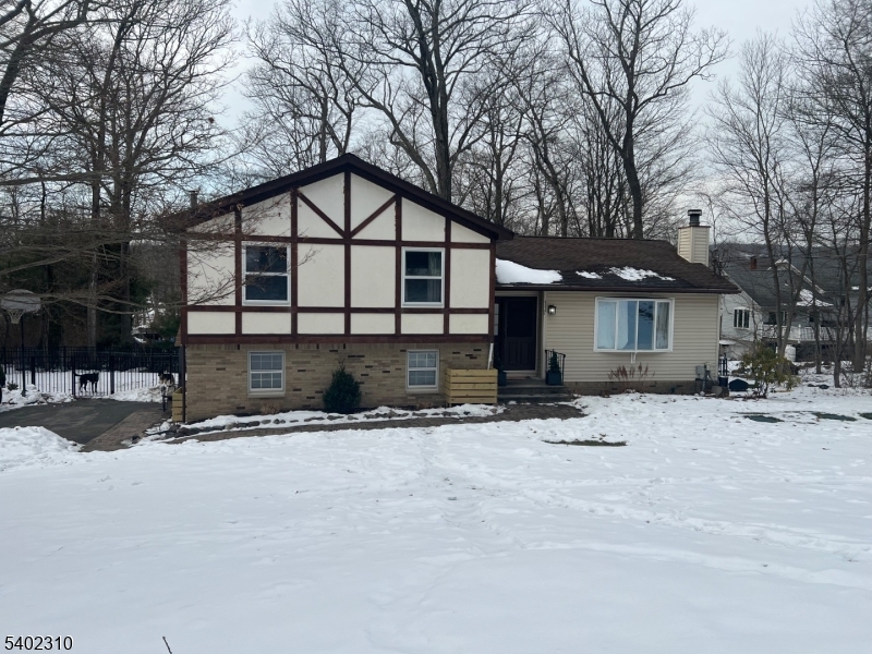 117 Papscoe Road West Milford, NJ 07421 - Photo 29 of 29 a view of a house with a yard covered in snow