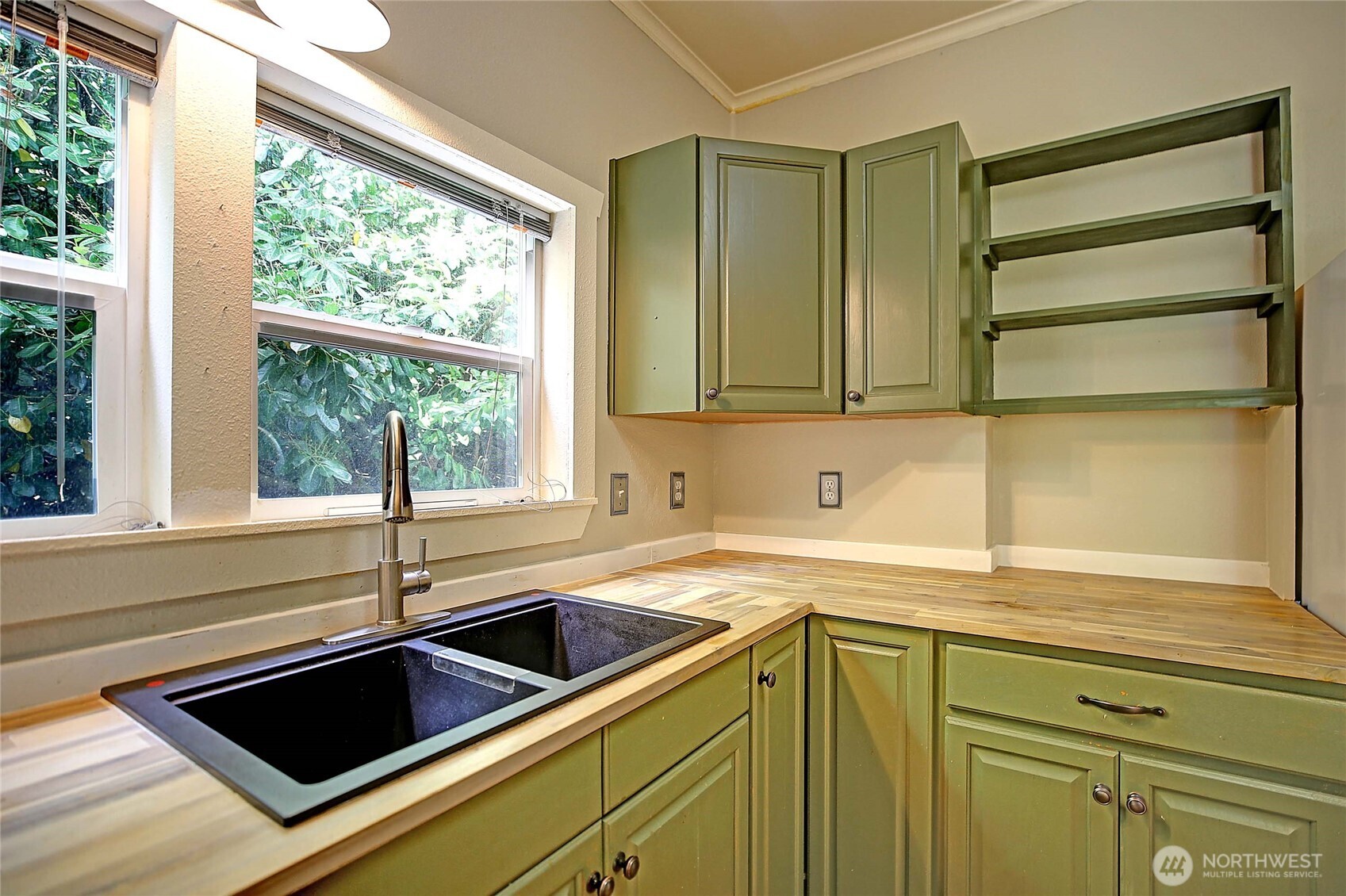 522 Chapman Road Camano Island, WA 98282 - Photo 7 of 26 a kitchen with a sink and a window