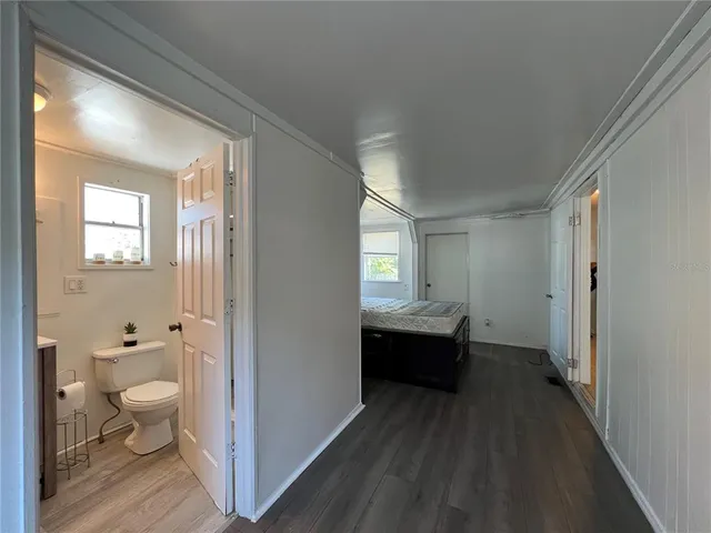 a bathroom with a sink a toilet and a tub