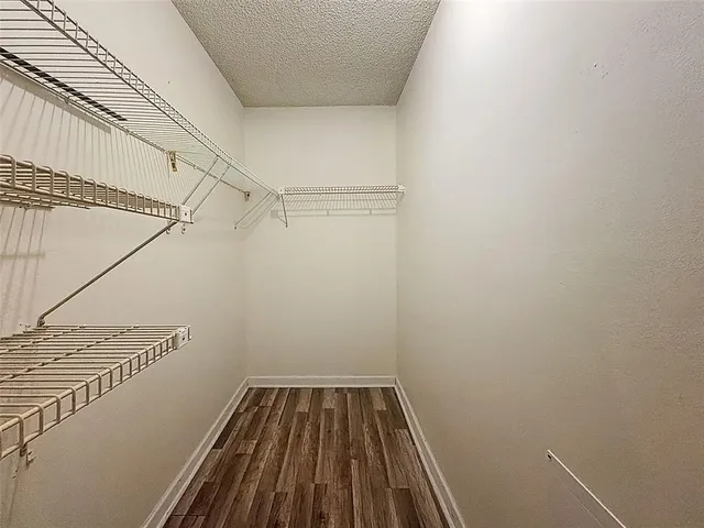 a view of a room with racks on the wall