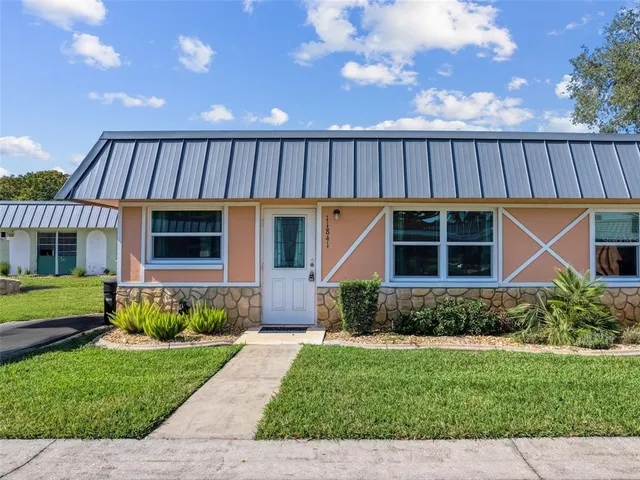 a front view of a house having yard