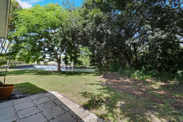 a view of backyard with green space