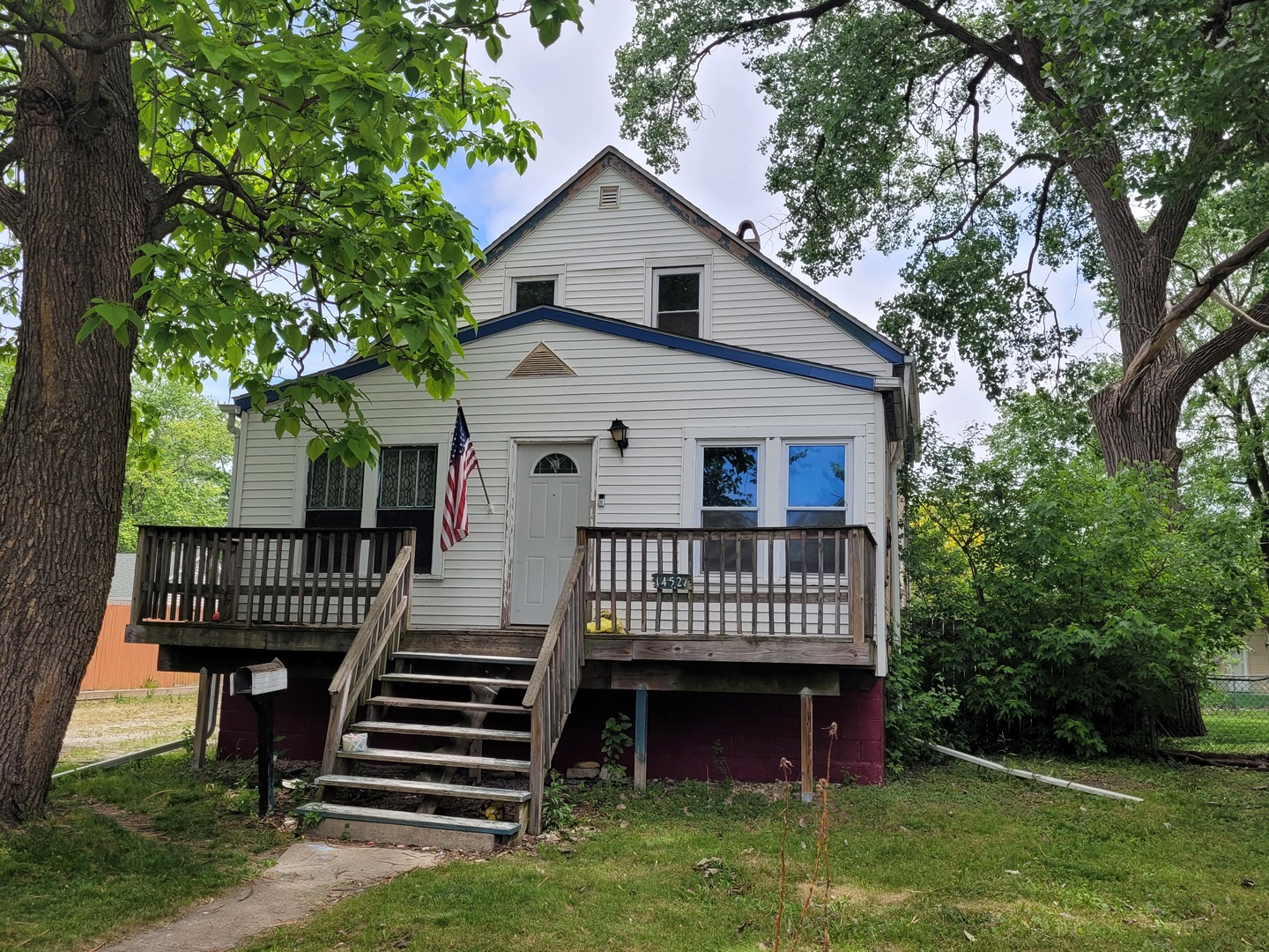 14521 Avers Avenue Midlothian, IL 60445 - Photo 1 of 13 a view of a house with a yard