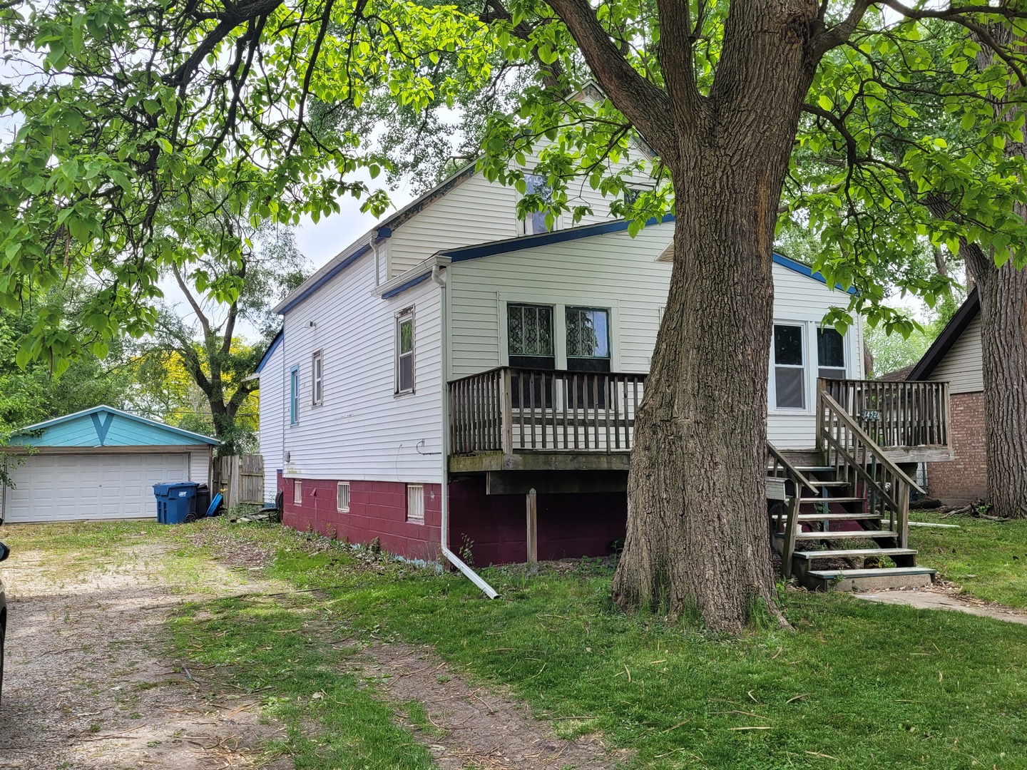14521 Avers Avenue Midlothian, IL 60445 - Photo 2 of 13 a view of a house with a yard and a large tree