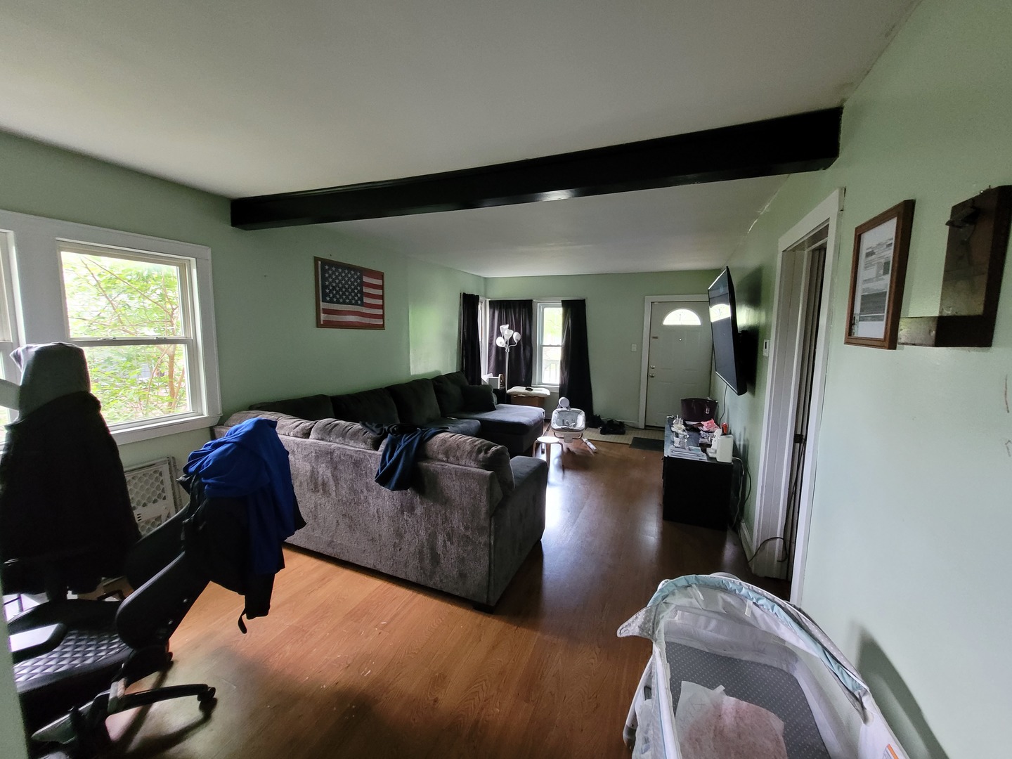14521 Avers Avenue Midlothian, IL 60445 - Photo 4 of 13 a living room with furniture rug and a large window