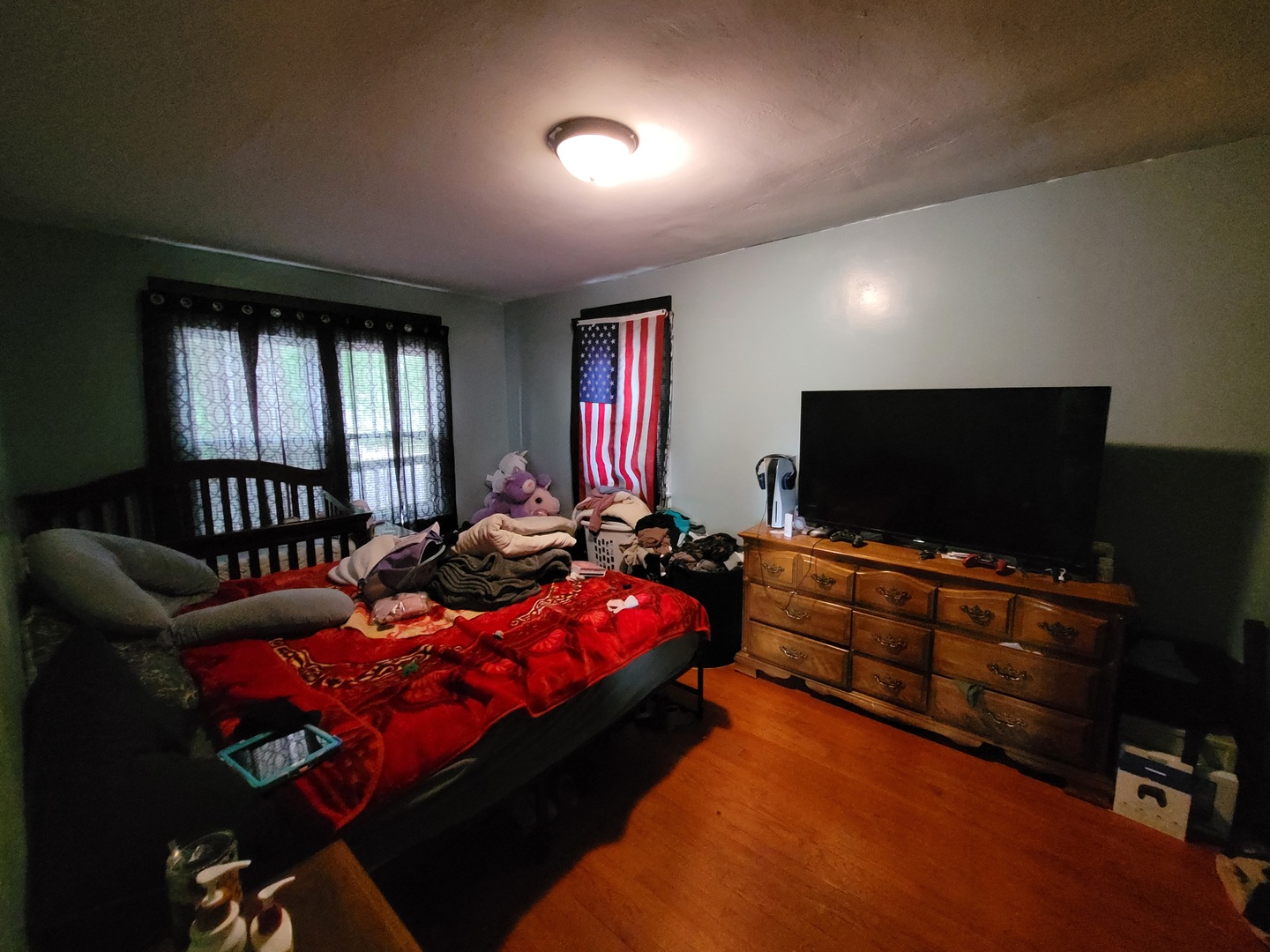 14521 Avers Avenue Midlothian, IL 60445 - Photo 8 of 13 a bedroom with furniture and a flat screen tv