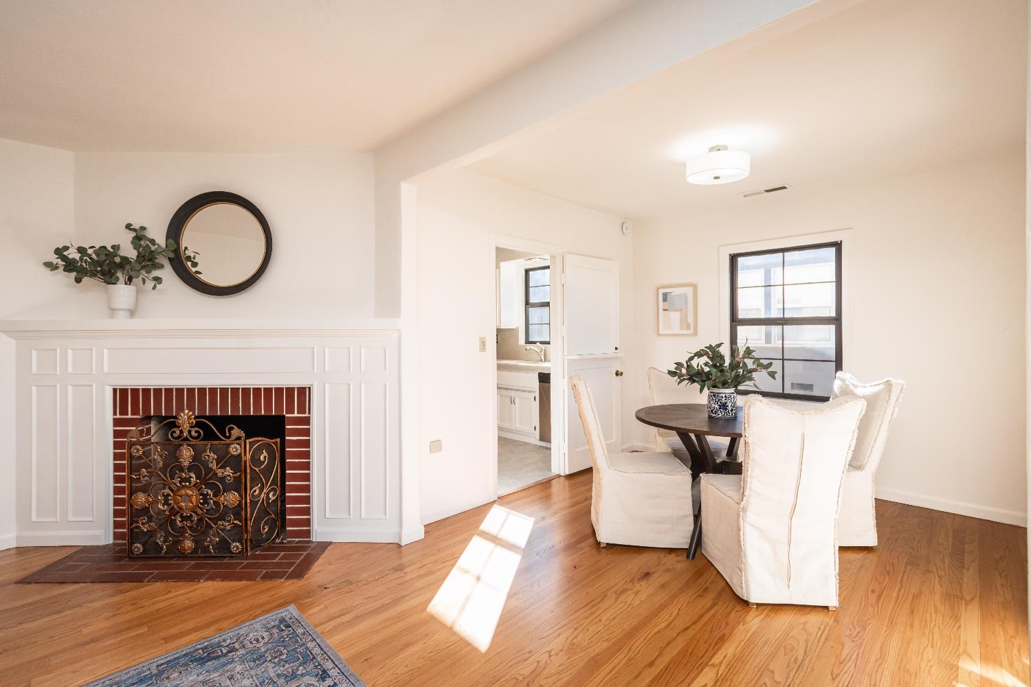 151 Coloma Way Sacramento, CA 95819 - Photo 6 of 28 a living room with furniture a fireplace and wooden floor