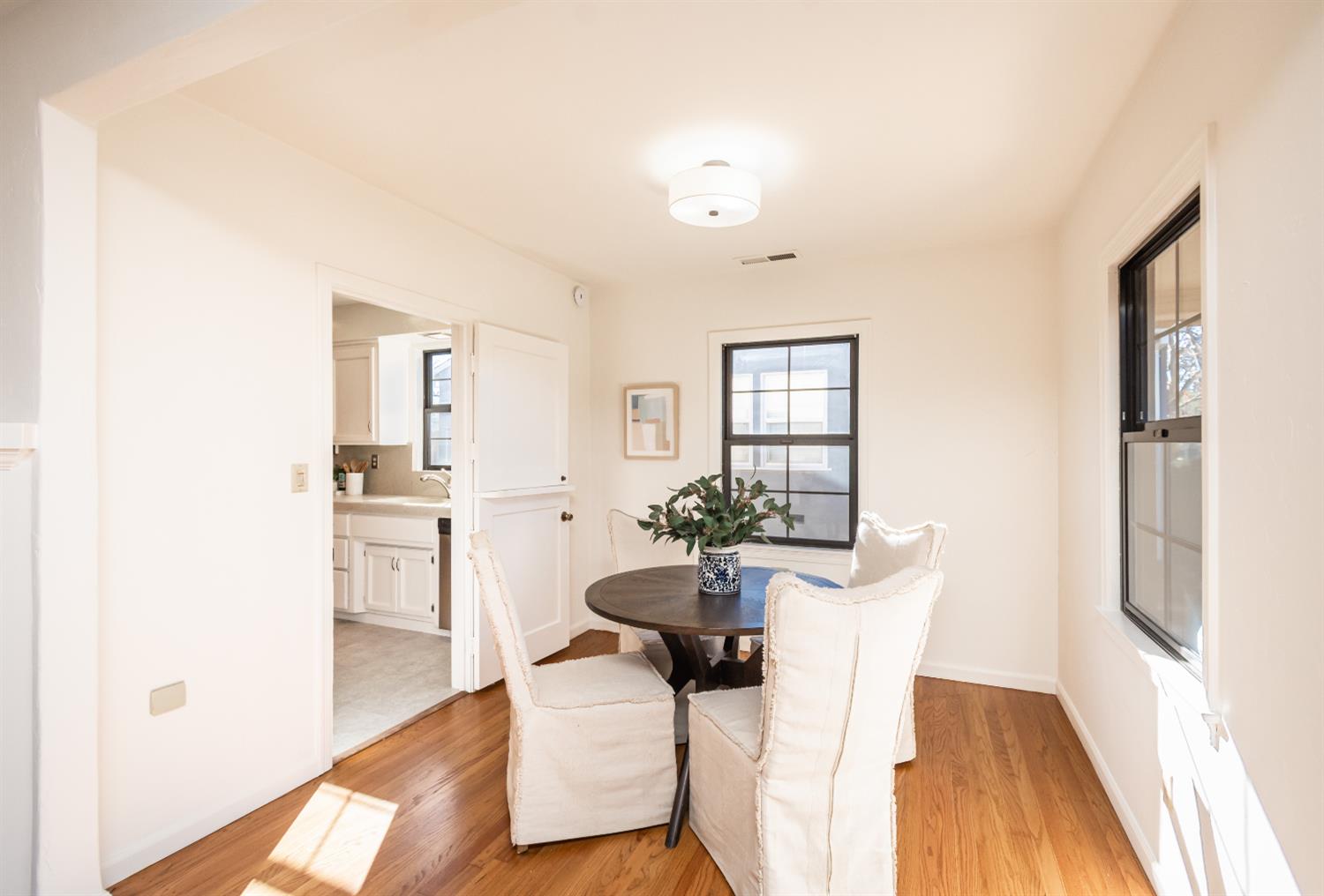 151 Coloma Way Sacramento, CA 95819 - Photo 7 of 28 a view of a dining room with furniture and wooden floor