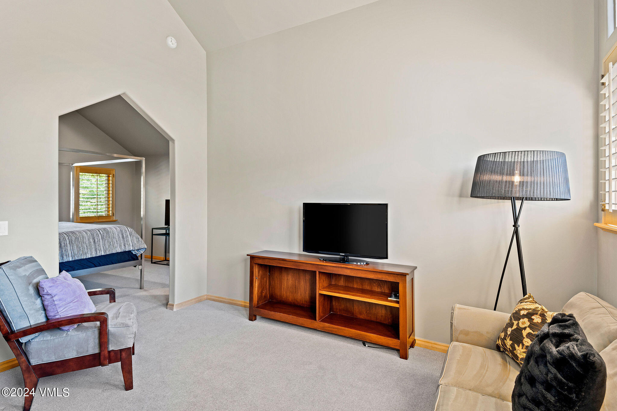 1675 Aspen Ridge Road Vail, CO 81657 - Photo 25 of 53 a living room with furniture and a flat screen tv