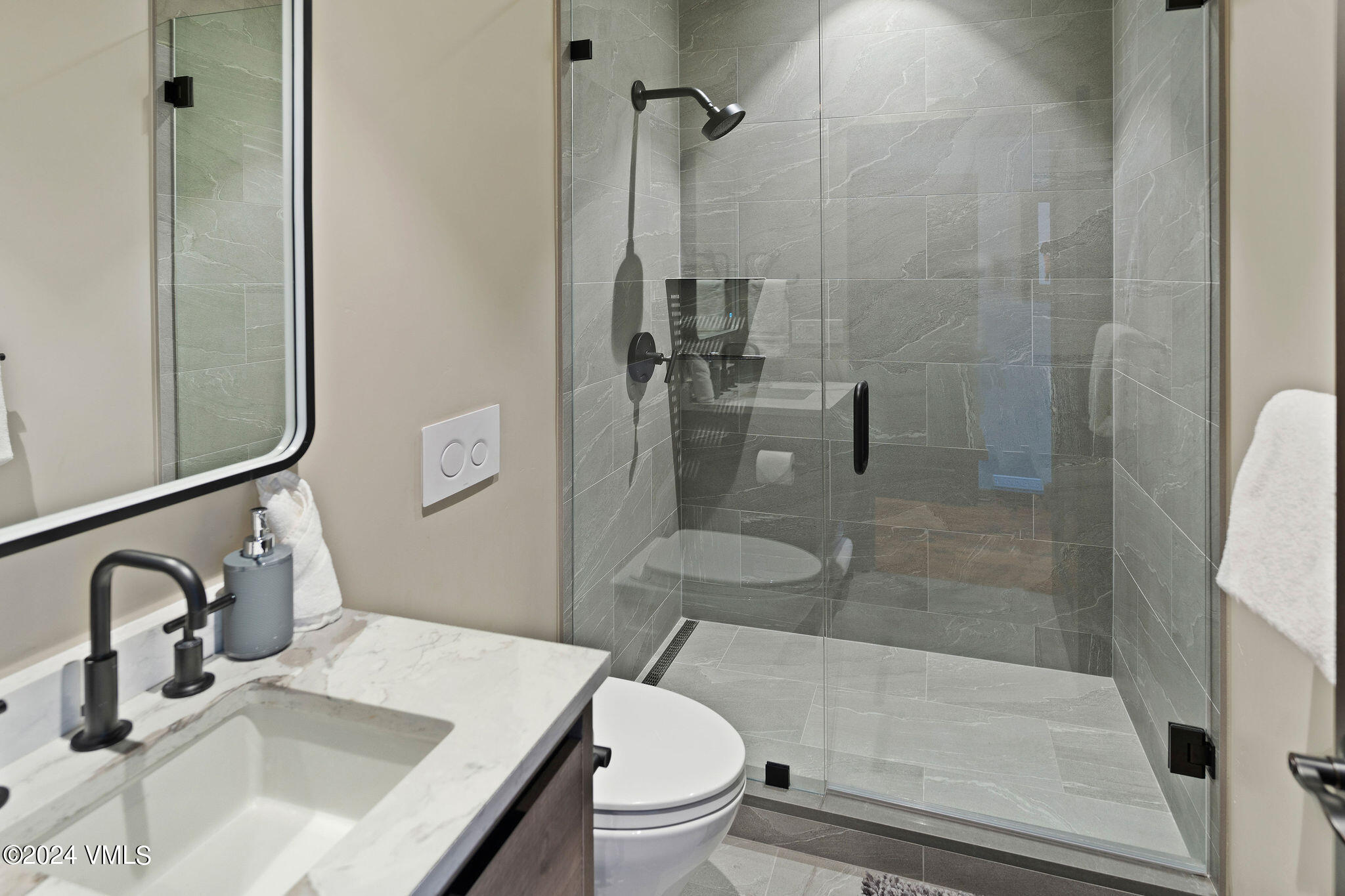 1675 Aspen Ridge Road Vail, CO 81657 - Photo 29 of 53 a bathroom with a sink toilet and shower