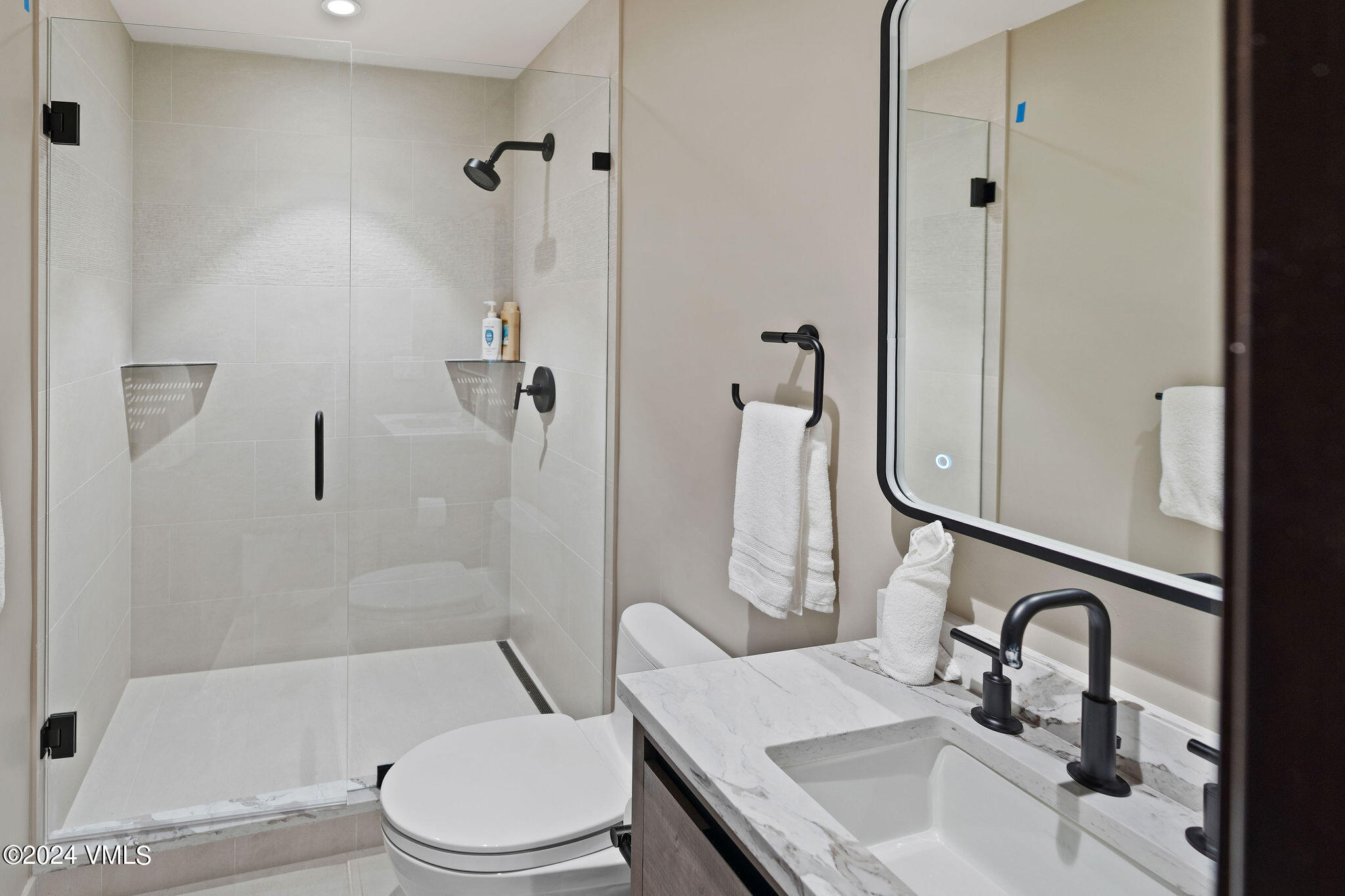 1675 Aspen Ridge Road Vail, CO 81657 - Photo 35 of 53 a bathroom with a sink toilet and shower