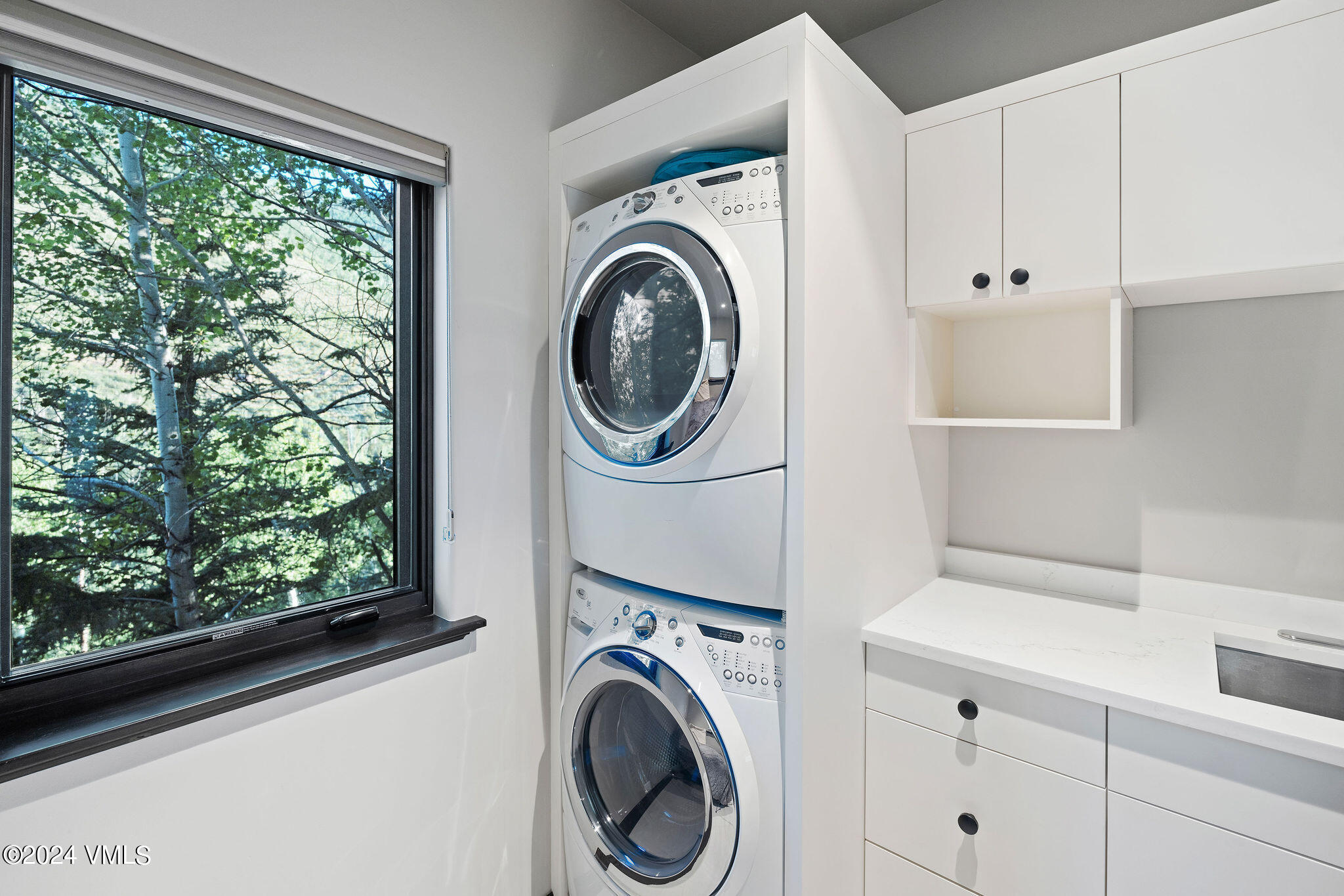 1675 Aspen Ridge Road Vail, CO 81657 - Photo 36 of 53 a utility room with dryer and washer