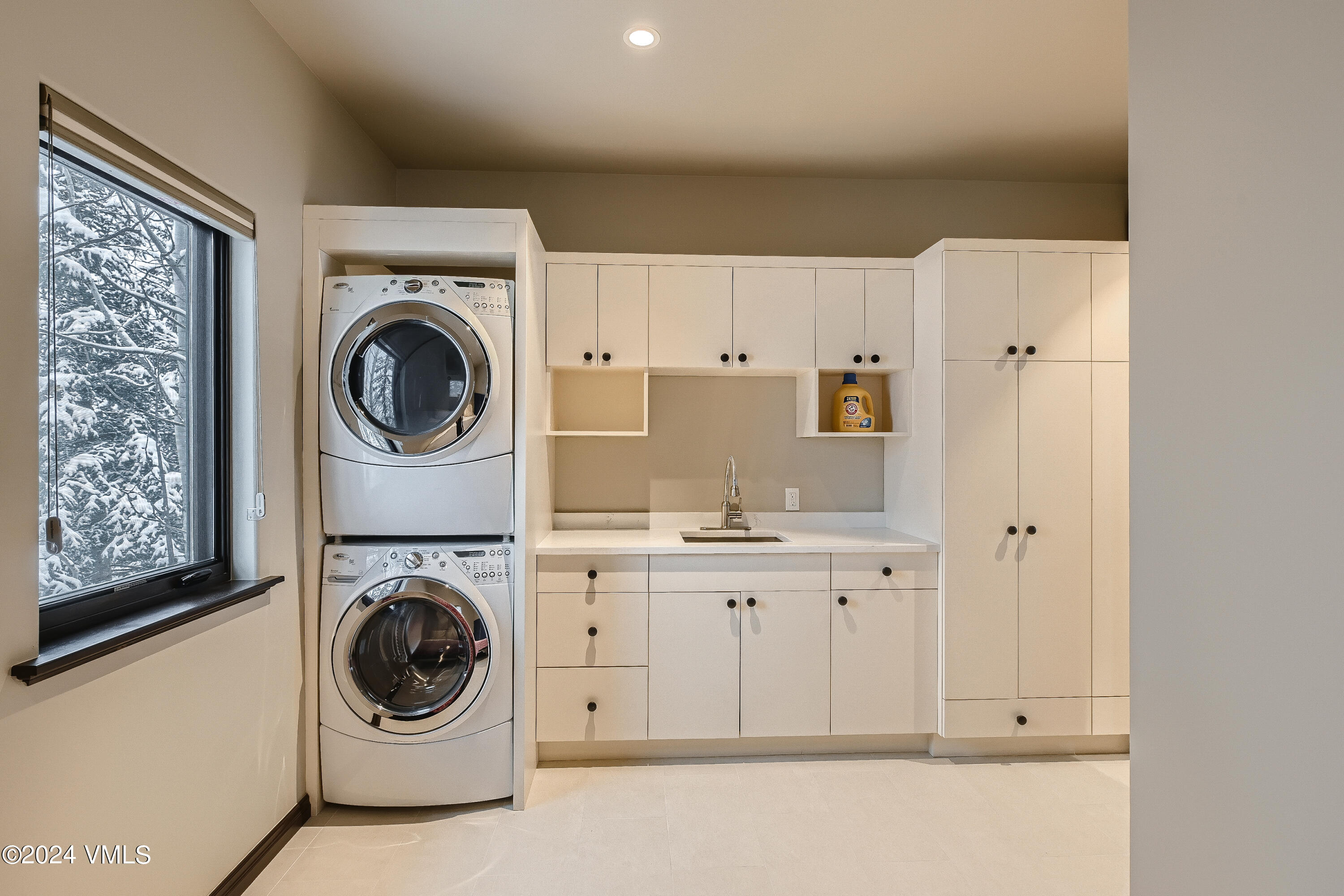 1675 Aspen Ridge Road Vail, CO 81657 - Photo 37 of 53 a utility room with dryer and washer
