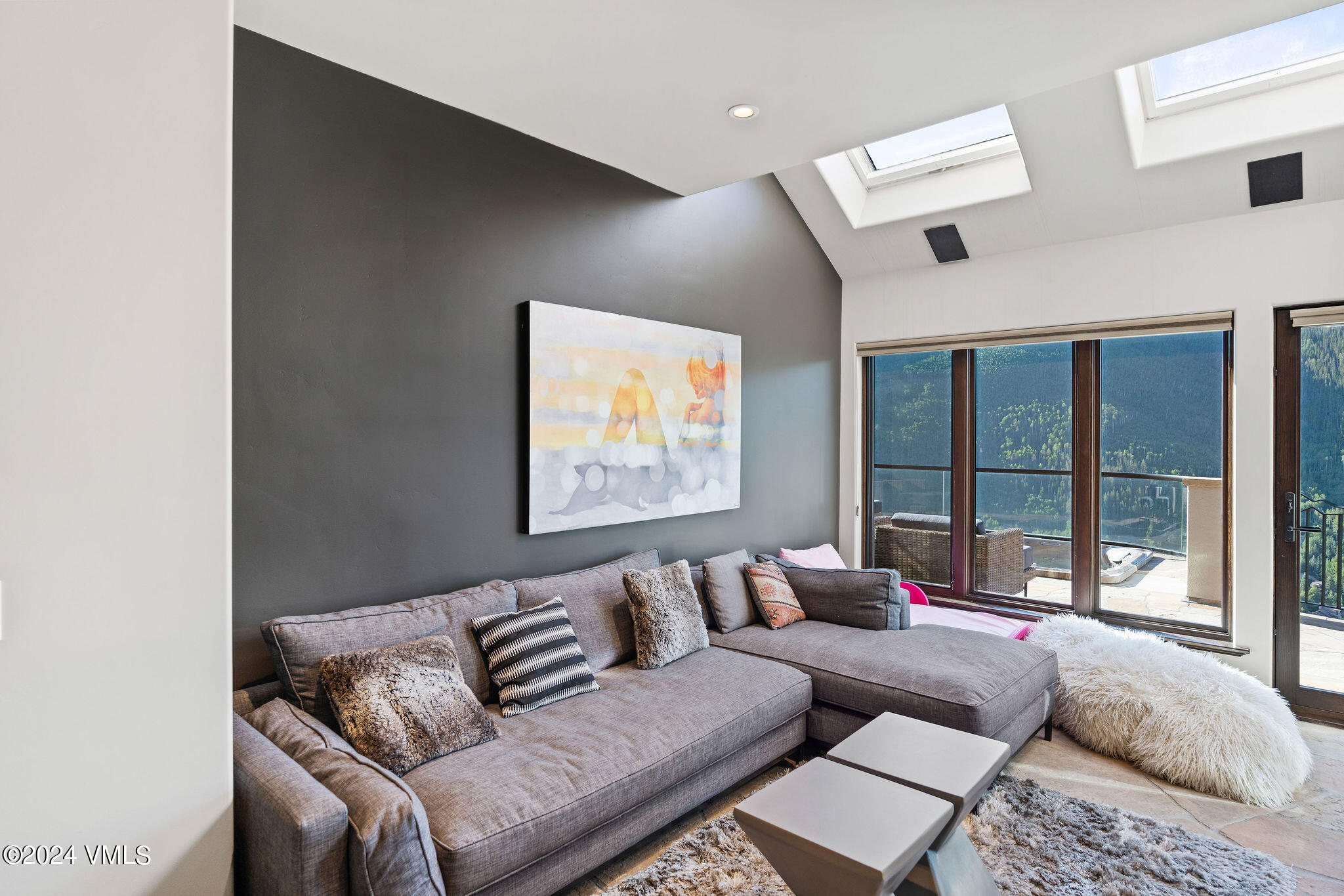 1675 Aspen Ridge Road Vail, CO 81657 - Photo 38 of 53 a living room with furniture and large window