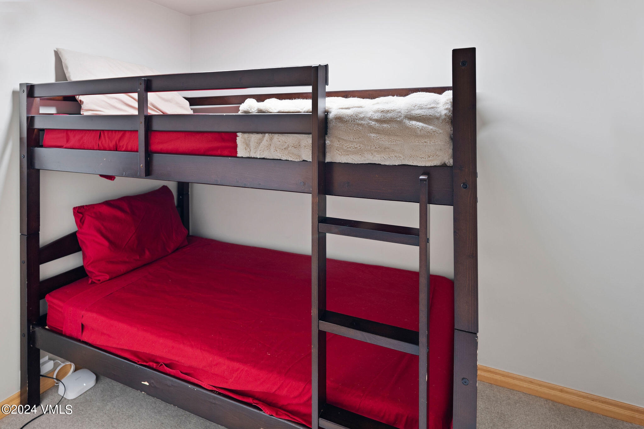 1675 Aspen Ridge Road Vail, CO 81657 - Photo 40 of 53 a bed room with a bed and a window