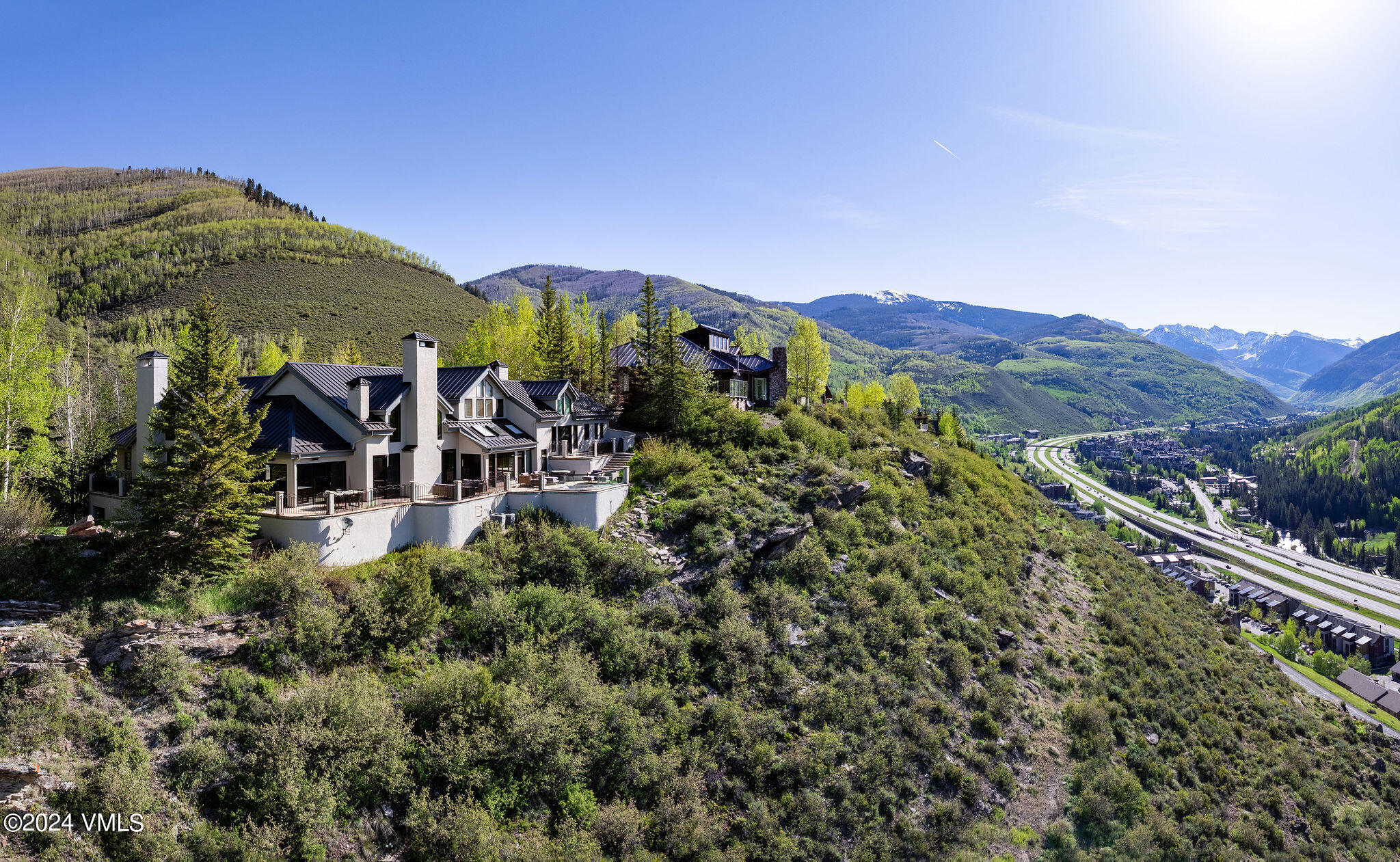 1675 Aspen Ridge Road Vail, CO 81657 - Photo 49 of 53 a view of a street with a building in the background