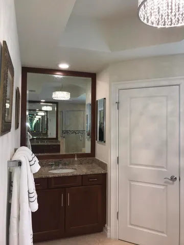 a view of living room with granite countertop furniture and fireplace