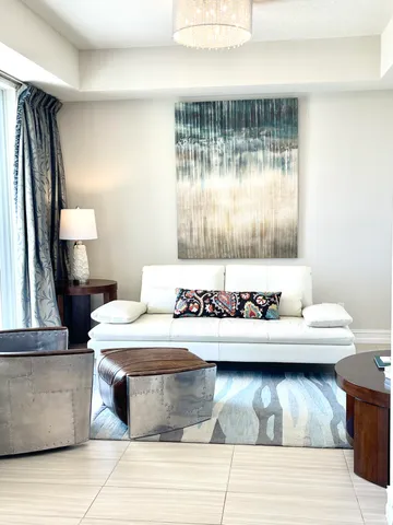 a room with a table and chairs