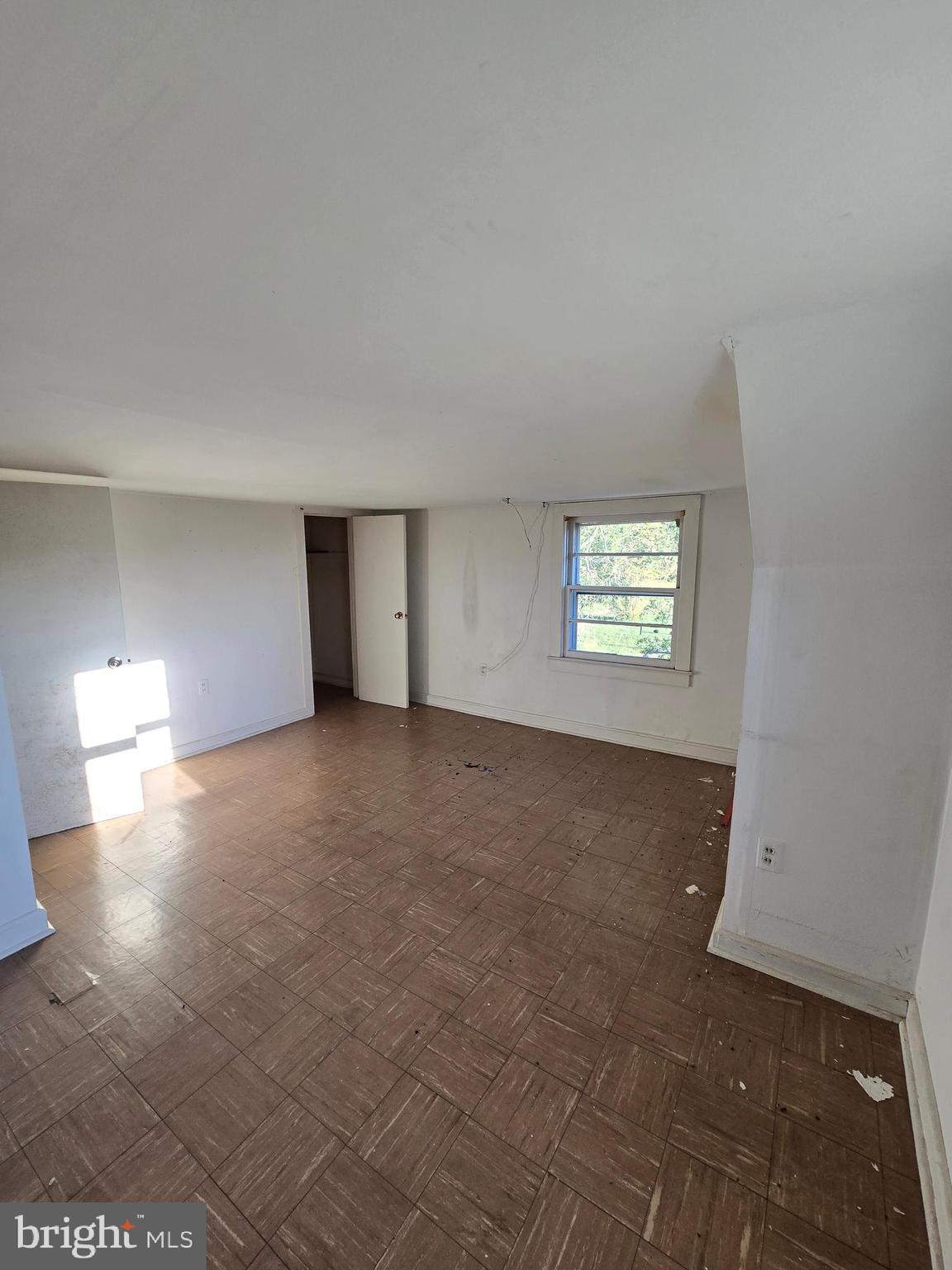 5258 Preston Road Federalsburg, MD 21632 - Photo 7 of 19 a view of an empty room with a window