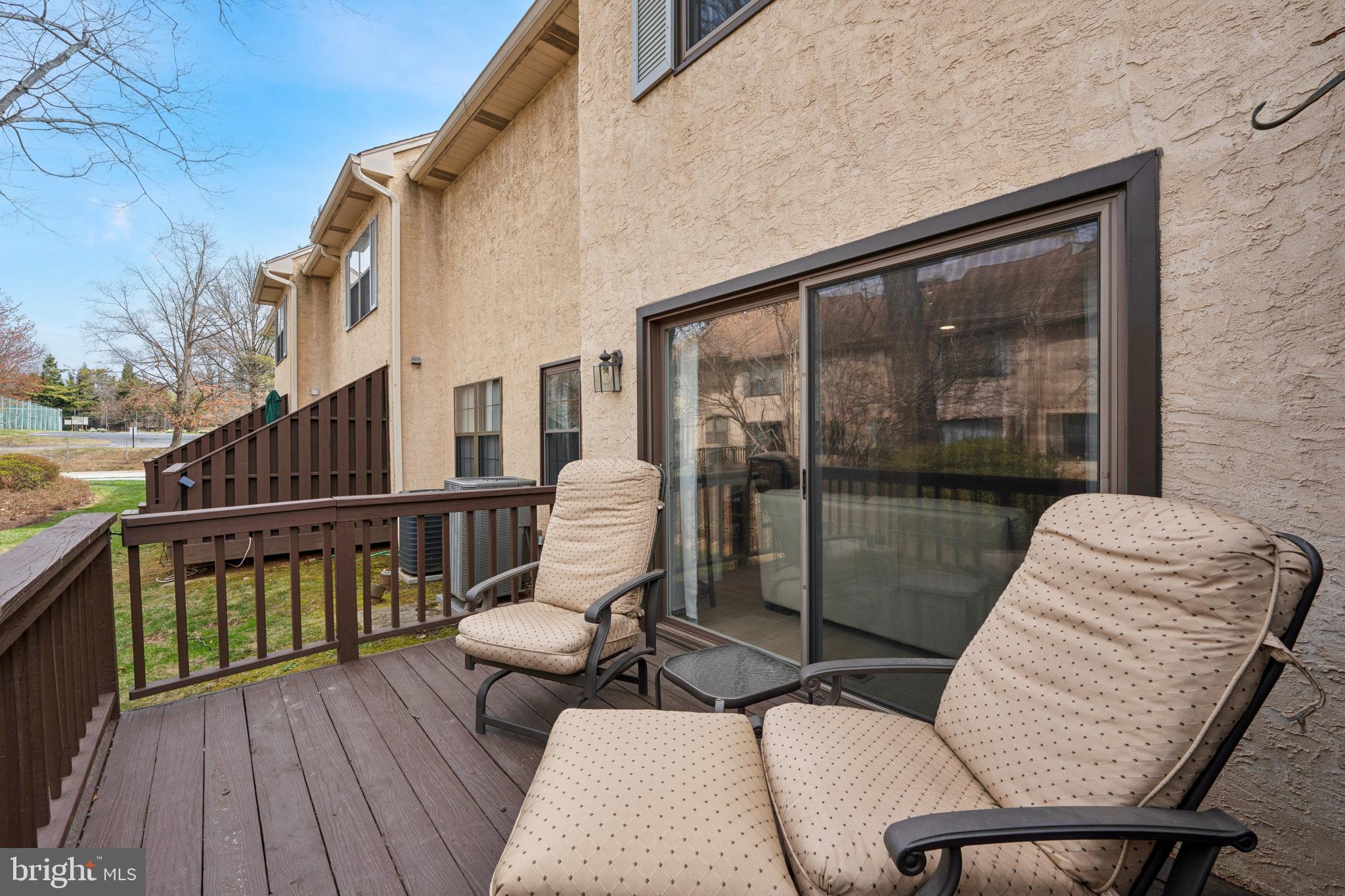 7 Chateau Circle, Unit 23 Chesterbrook, PA 19087 - Photo 21 of 23 Back deck with afternoon sun