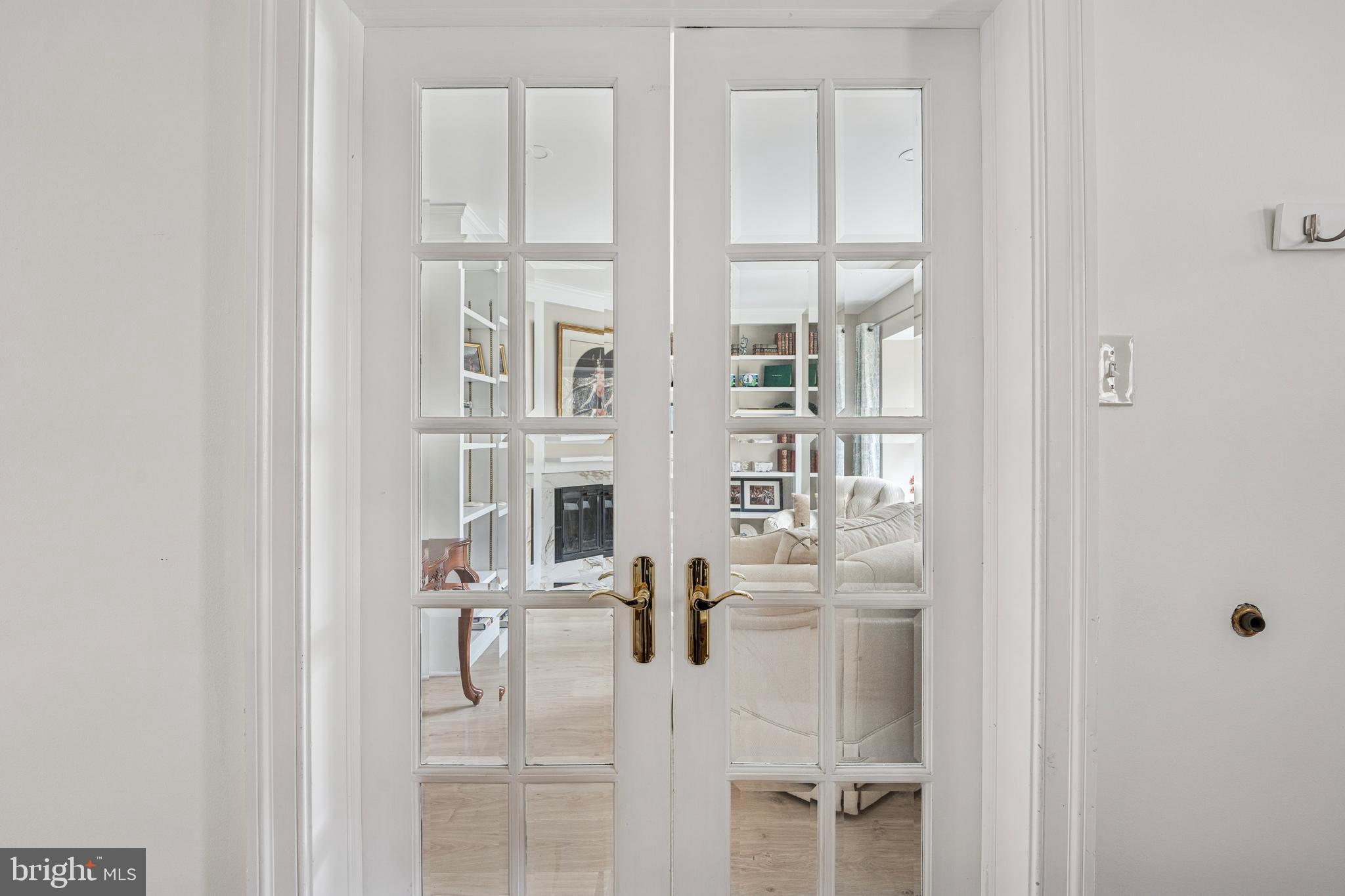 7 Chateau Circle, Unit 23 Chesterbrook, PA 19087 - Photo 4 of 23 Den with beveled glass doors