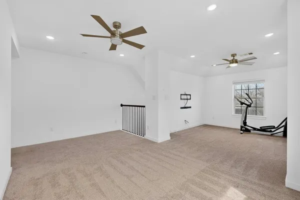 a view of a livingroom with a ceiling fan