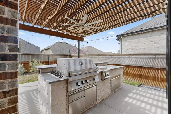 a view of a kitchen with furniture