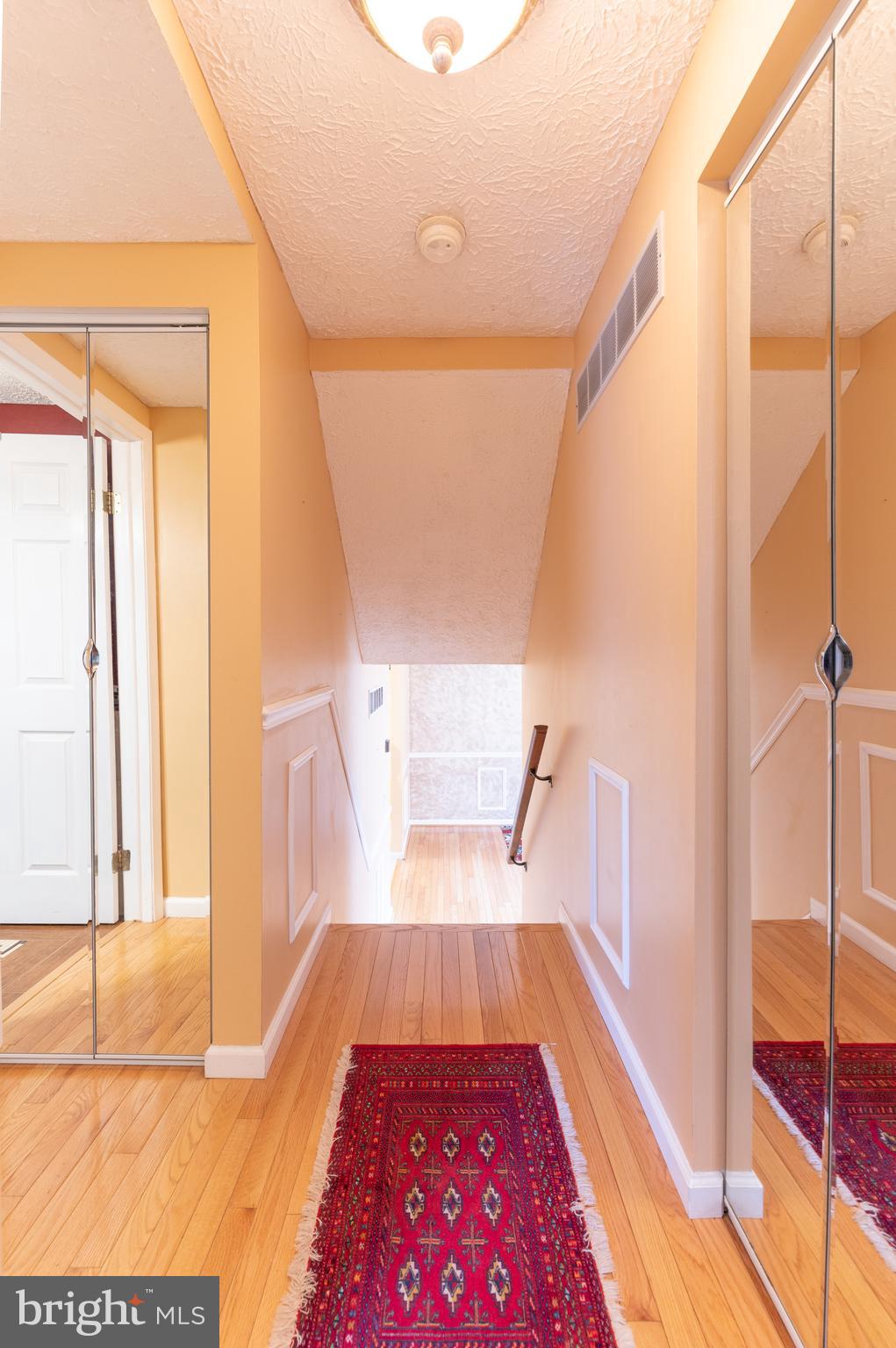 24237 Newbury Road Gaithersburg, MD 20882 - Photo 21 of 30 Hallway to Stairs