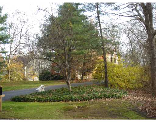 55 Linden Road Barrington, RI 02806 - Photo 10 of 12 Exterior Front. Nice screening from the rpad offers privacy - walk to water, boats, and interesting views abound in all directions
