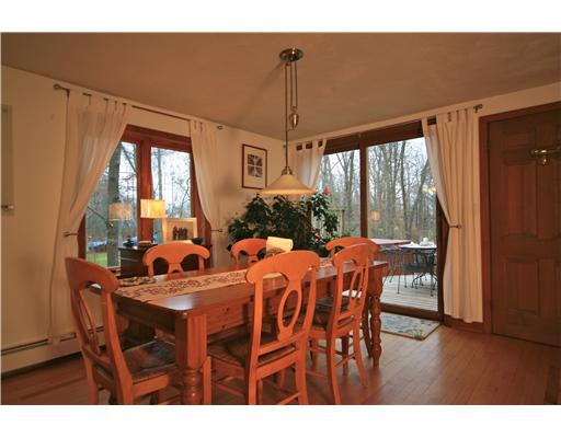 55 Linden Road Barrington, RI 02806 - Photo 3 of 12 Dining Room. Dining can be so much more fun when all are near the opened kitchen and can still look into thr views of the greatroom with stove or filreplace ... see the deck beyond offers outside dining area as well