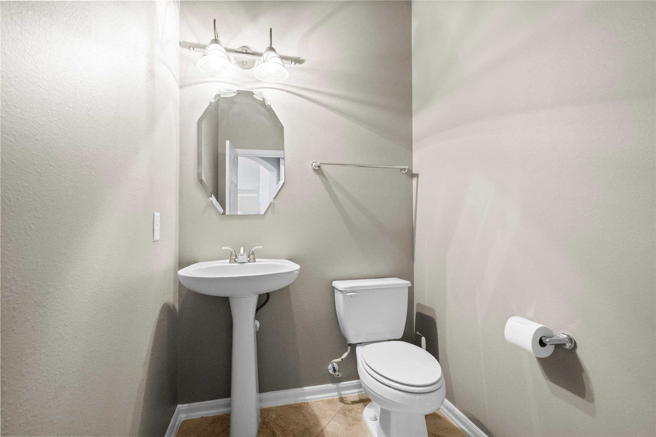 5307 Amber Sky Lane Rosharon, TX 77583 - Photo 12 of 44 a bathroom with a toilet sink and mirror