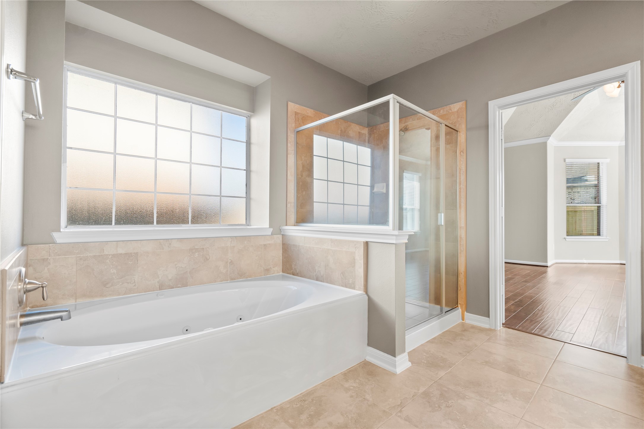 5307 Amber Sky Lane Rosharon, TX 77583 - Photo 16 of 44 a bathroom with a bathtub and a shower