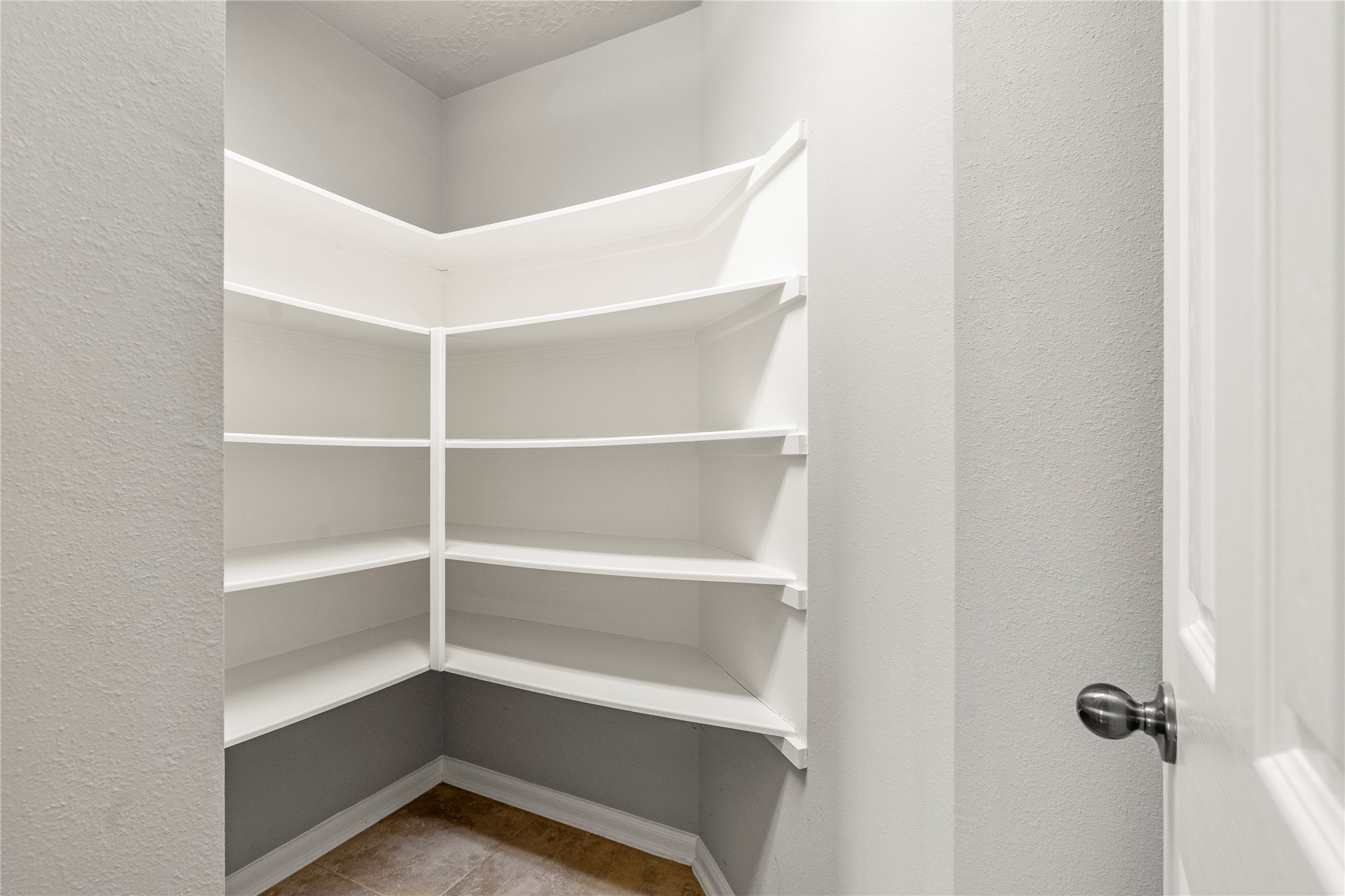 5307 Amber Sky Lane Rosharon, TX 77583 - Photo 18 of 44 a view of an empty walk in closet