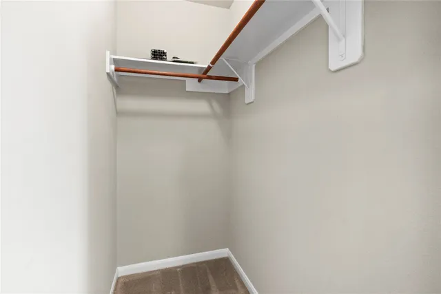 a view of small space with racks on the wall