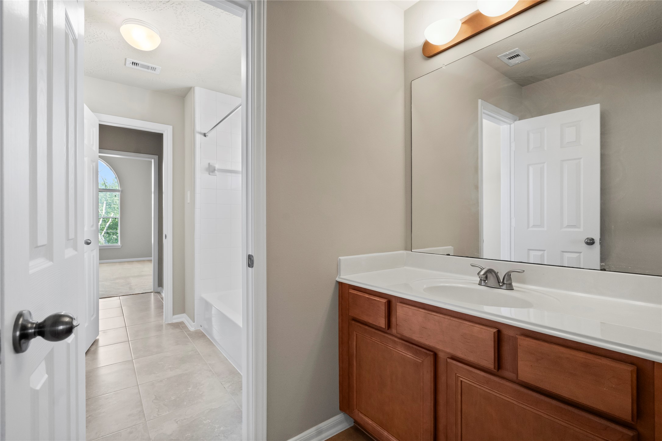5307 Amber Sky Lane Rosharon, TX 77583 - Photo 34 of 44 a bathroom with a sink and a mirror