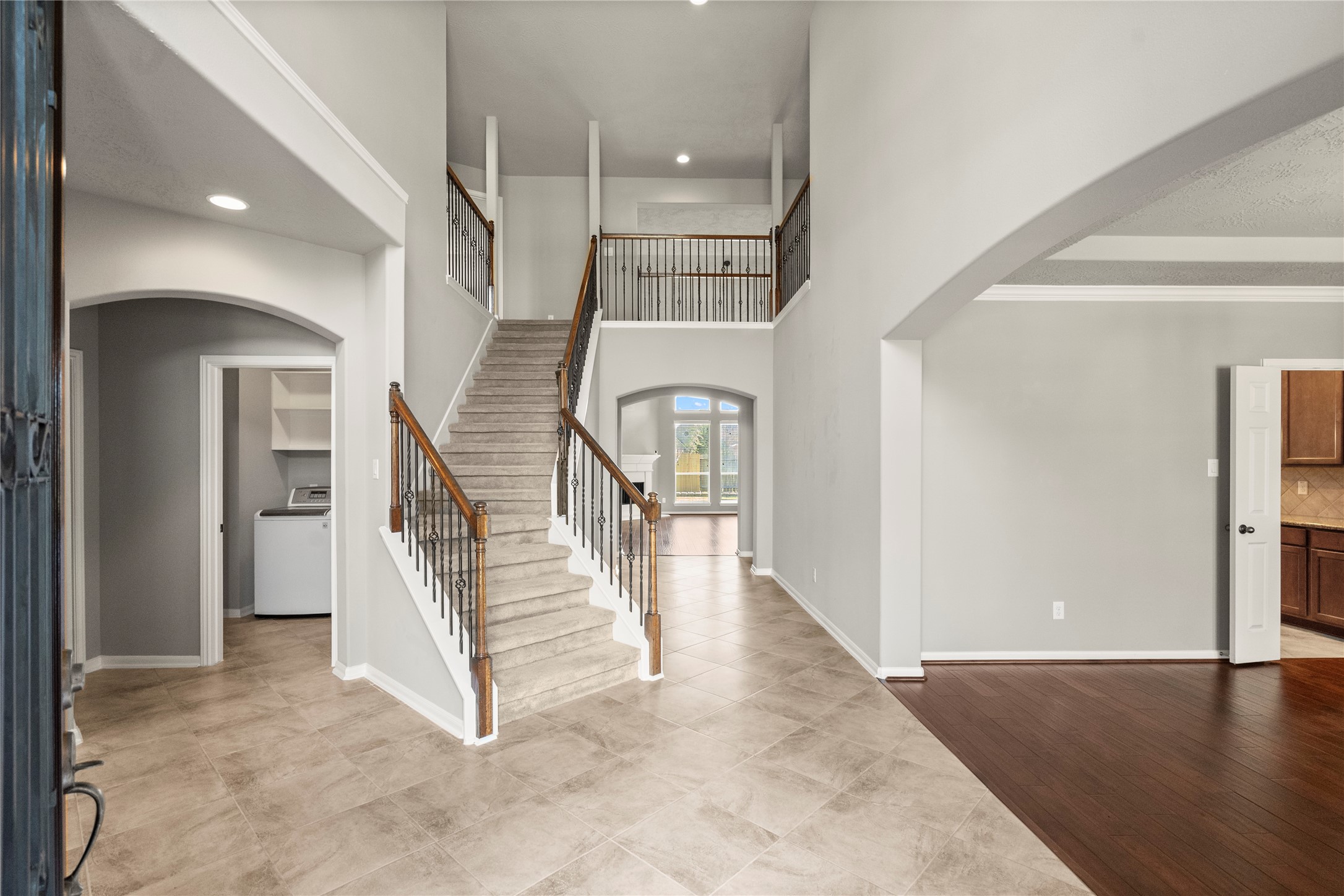 5307 Amber Sky Lane Rosharon, TX 77583 - Photo 5 of 44 a view of entryway and hall with wooden floor