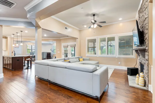a view of a porch with furniture and a yard