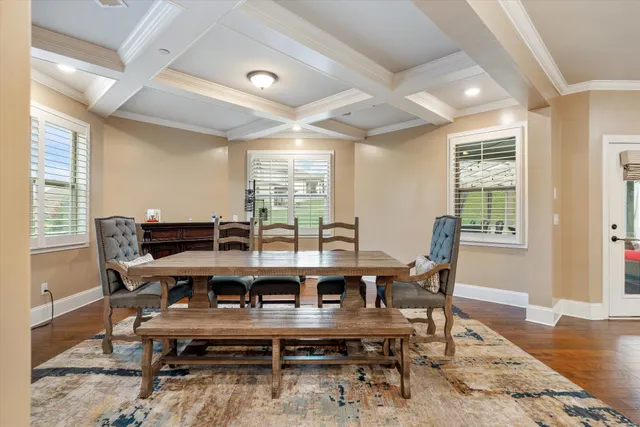 an aerial view of house with yard swimming pool and outdoor seating