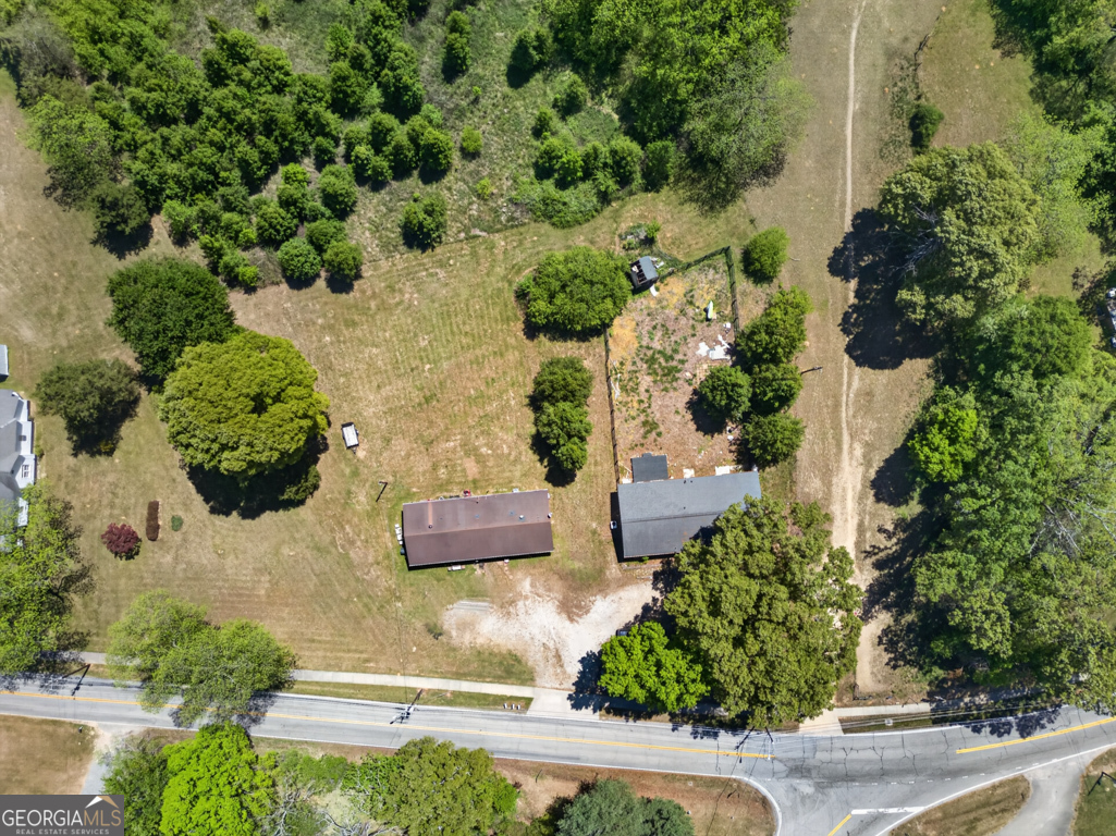 481 Main Street Clermont, GA 30527 - Photo 17 of 43 an aerial view of a house with a yard