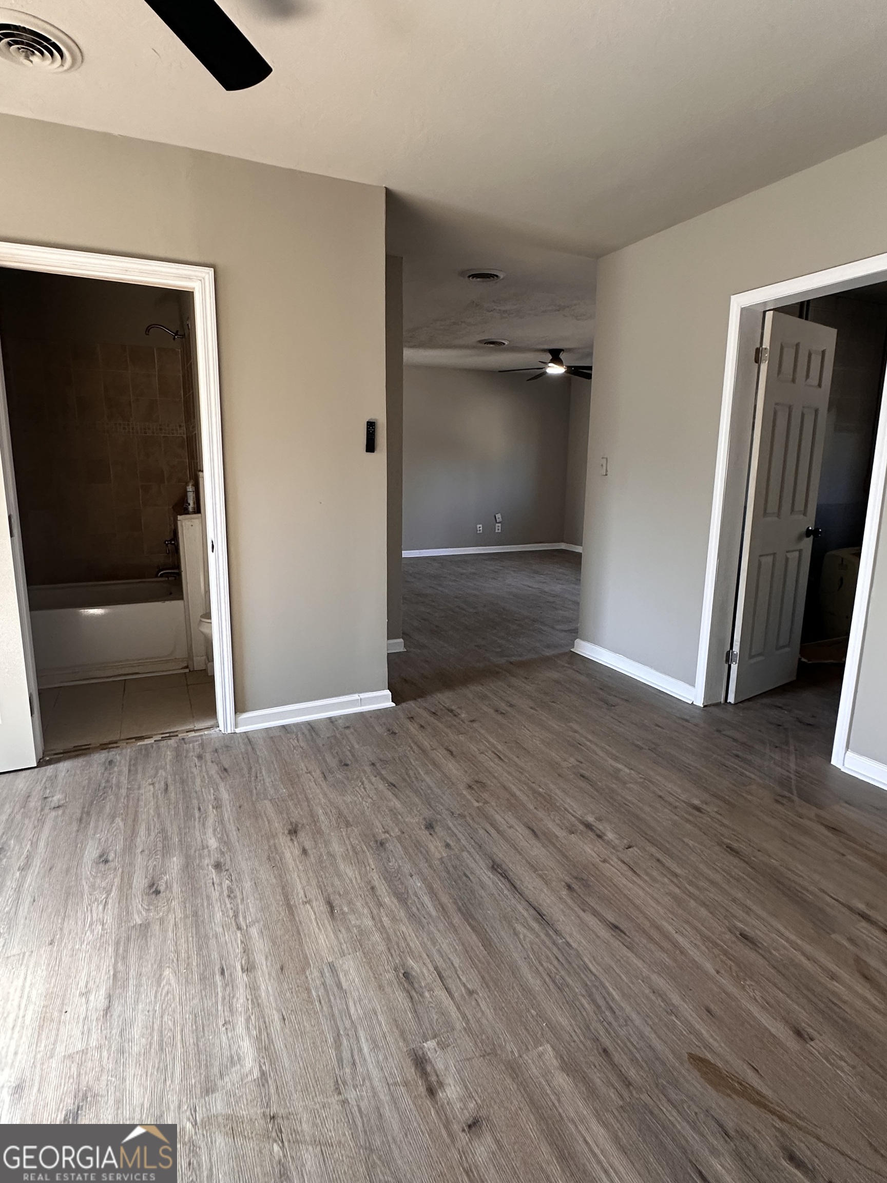 481 Main Street Clermont, GA 30527 - Photo 18 of 43 a view of empty room with wooden floor